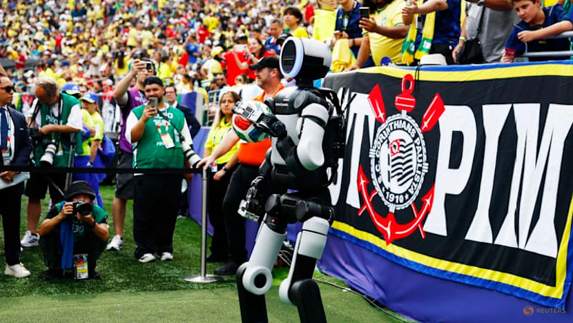 Atlas, the humanoid robot, delivers match ball at World Cup