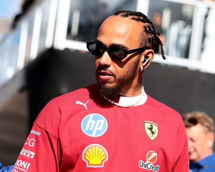 Hamilton denies Ferrari friction after Elkann criticism