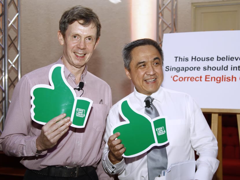 Speakers Mr Simon Reynolds and Mr Adrian Tan, at the  Launch of the Speak Good English Movement 2014 on May 28, 2014. Photo: Ernest Chua