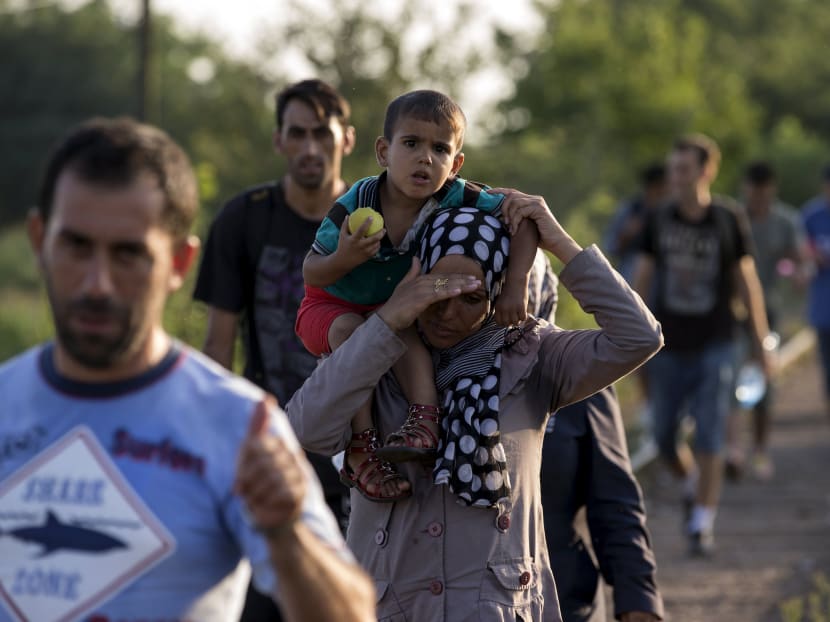 Refugees or migrants? Debate over words to describe crisis