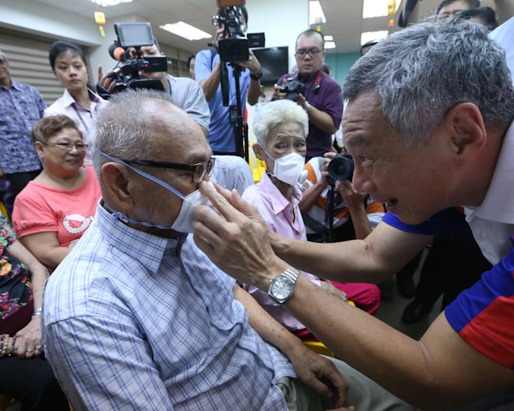 Face masks, supplies given to the vulnerable to cope with haze