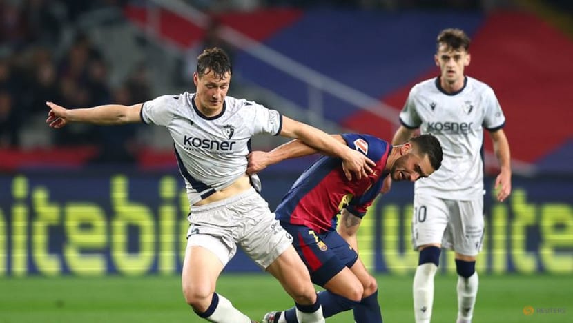 Barcelona ease past Osasuna to go three points clear