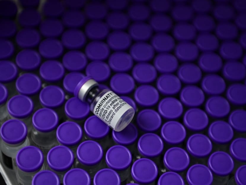 A box of Comirnaty vaccines by Pfizer-BioNTech at an outdoor vaccination centre set up by the French Red Cross in Paris. A box of Comirnaty vaccines by Pfizer-BioNTech at an outdoor vaccination centre set up by the French Red Cross in Paris.