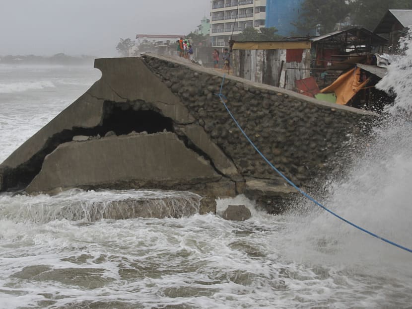 Typhoon leaves 11 dead, Filipino villagers saved from flood