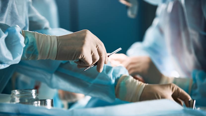 Doctor accused of causing patient's death by cutting wrong arteries restricted from surgery for 18 months