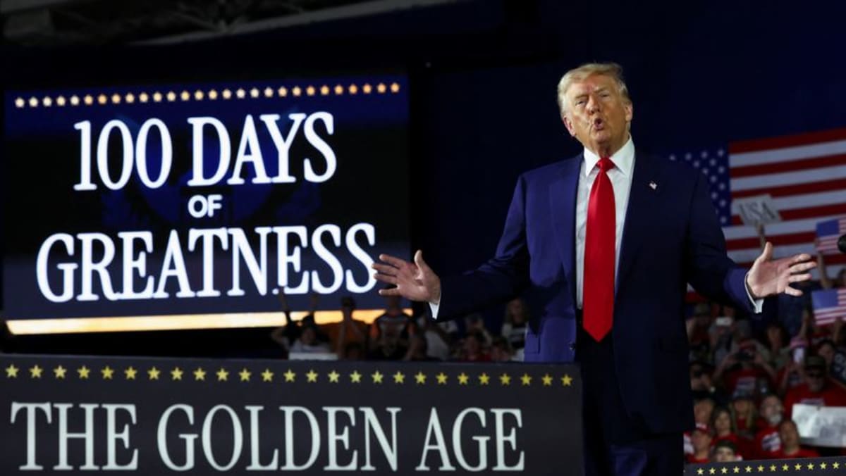 Trump touts economy at Michigan 100-day rally, as Americans grow wary