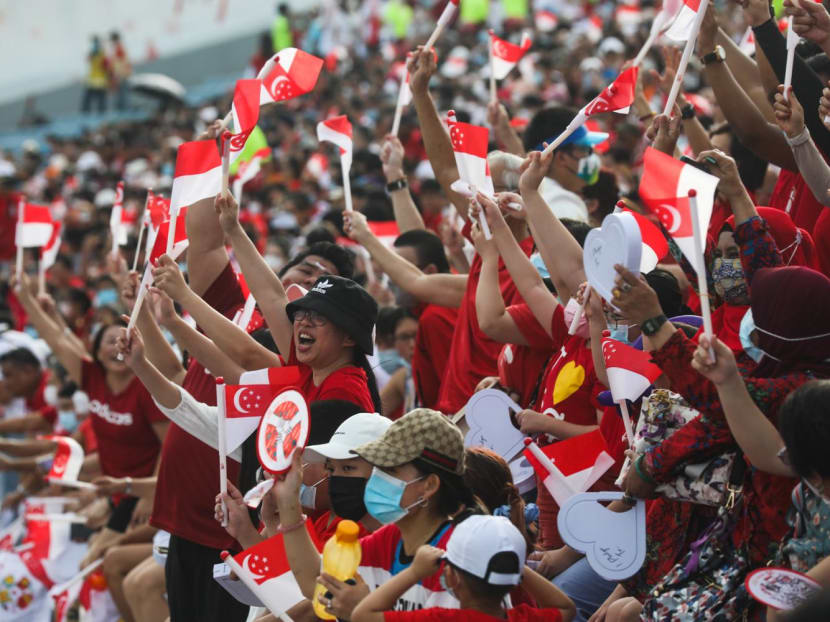 Spectators at a National Day Parade preview show in July 2022. Spectators at a National Day Parade preview show in July 2022.