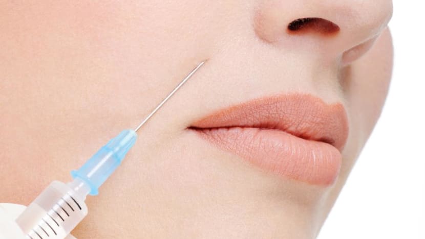Beautician who persistently performed aesthetic procedures without licence jailed, fined