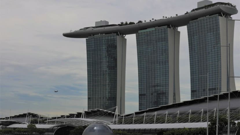 Covid-19: Woman to be charged with pulling down enforcement officer's mask in Marina Bay Sands clash