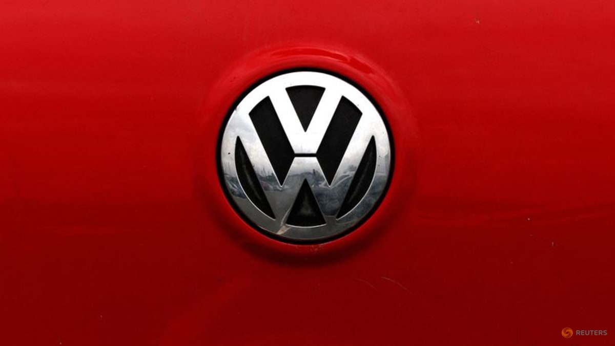 Volkswagen profit plunges as carmaker weighs mass job cuts