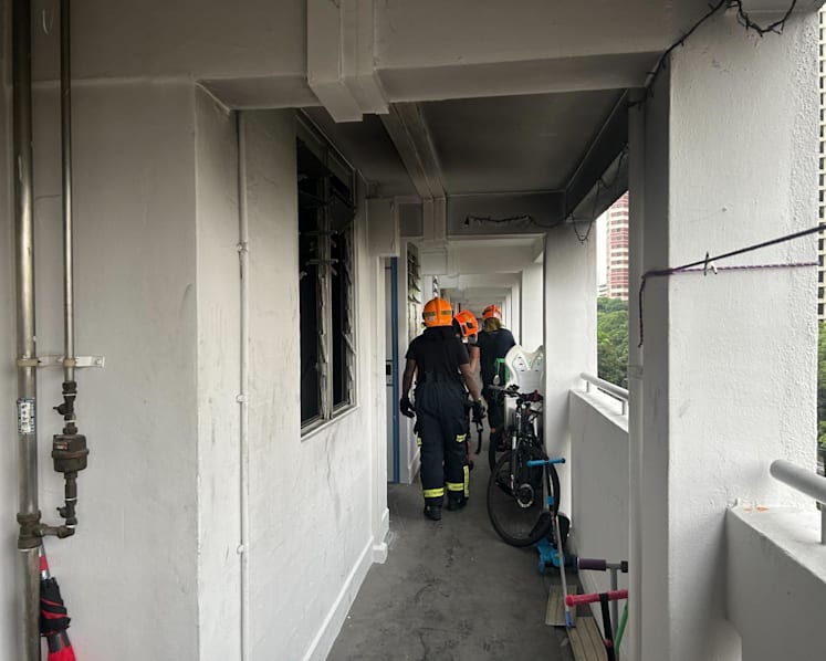 Witness says 3 children rescued from Redhill flat fire covered in soot, 'looked scared' but able to walk