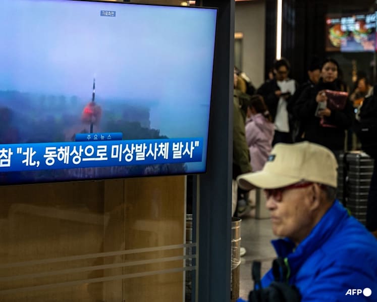 North Korea fires 'around a dozen' ballistic missiles into East Sea North Korea fires 'around a dozen' ballistic missiles into East Sea
