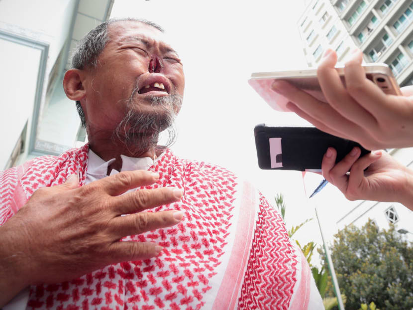 Senior Staff Sergeant Seah Chin Peng deliberately stepped on the walking stick of “Parrot Man” Zeng Guoyuan (pictured), then lied to his superior, telling her it had happened because he had “lost his balance”.