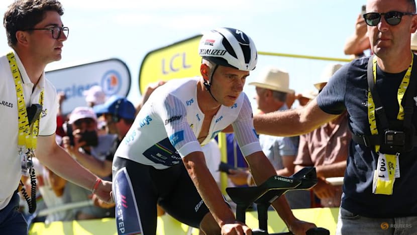 Pogacar turns focus to road race after time trial disappointment