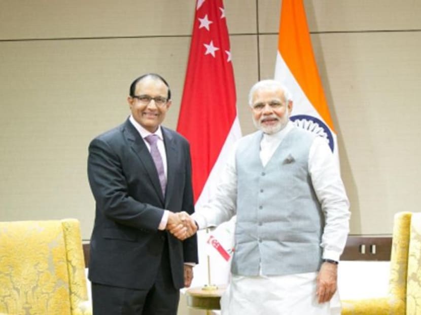 Singapore's Second Minister for Home Affairs and Trade and Industry S Iswaran (L) and India's Prime Minister Narendra Modi in Guajarat. Photo: Ministry of Trade and Industry