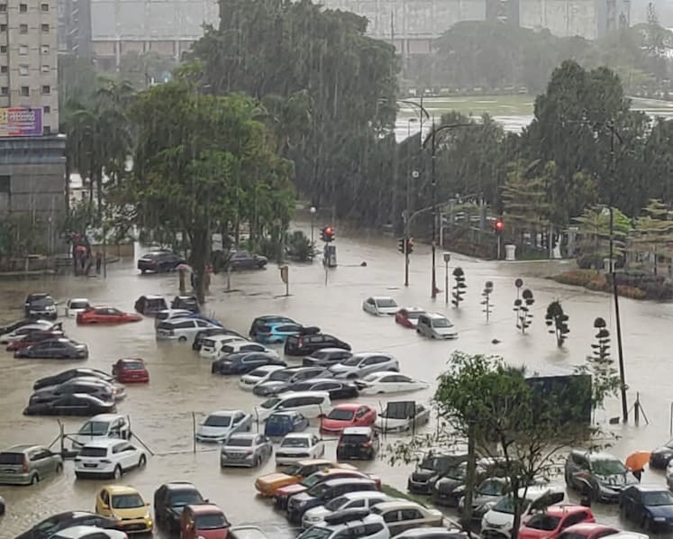 Flash floods hit parts of Johor Bahru, leaving vehicles trapped in water   