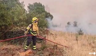 Hundreds battle new mega-wildfire in Spain