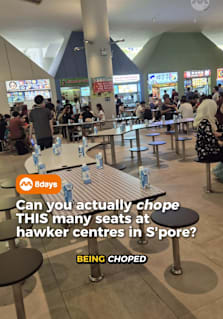 A Reddit post showing multiple tables at Punggol Coast Hawker Centre being “choped” with bottled water — despite nobody sitting there — has sparked debate online among Singaporeans. Some called the practice inconsiderate during lunch hour, some suggesting to take over the seats despite being choped. But is reserving, or chope-ing, actually illegal? According to the National Environment Agency, diners in Singapore will not be fined for choping seats at hawker centres, though the agency encourages the public to remain considerate when sharing communal dining spaces. The post has since reignited conversations online about etiquette, fairness and the limits of chope culture in Singapore. #8dayssg #8dayssgtrending #singapore #sgtiktok #chope 