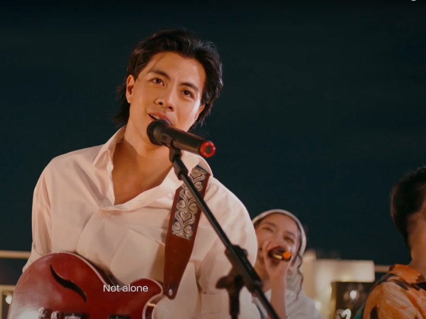 A screenshot from the official video showing singer-songwriter Benjamin Kheng performing the 2024 National Day theme song Not Alone.