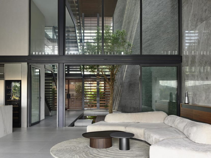 This house in Singapore is a tropical oasis filled with plenty of light and greenery This house in Singapore is a tropical oasis filled with plenty of light and greenery