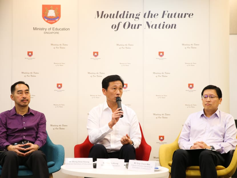 (From left) Mr Wong Siew Hoong, Director-General of Education, Minister for Education Ong Ye Kung and Mr Sng Chern Wei, Deputy Director-General of Education (Curriculum) at a press briefing at the Ministry of Education on Friday (Sept 28). (From left) Mr Wong Siew Hoong, Director-General of Education, Minister for Education Ong Ye Kung and Mr Sng Chern Wei, Deputy Director-General of Education (Curriculum) at a press briefing at the Ministry of Education on Friday (Sept 28).