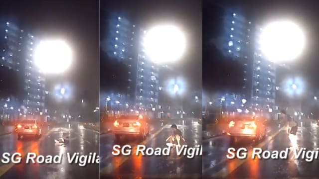 怪男夜躺路中央淋雨 险遭轿车碾过丢命