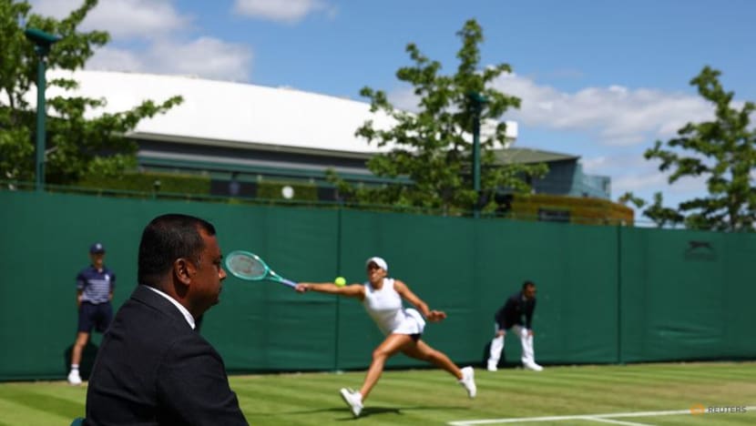 Wimbledon's human touch yields to electronic eyes but officials embrace new role