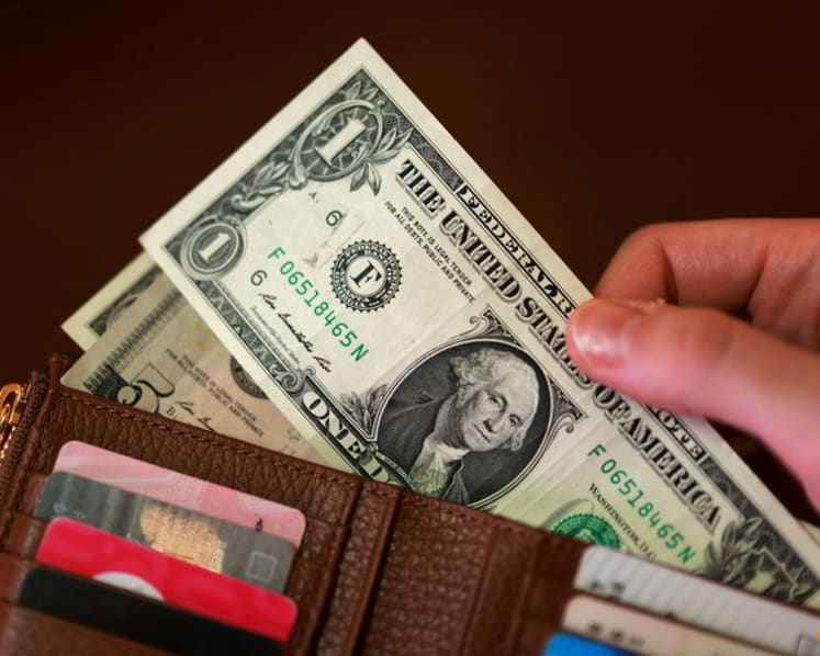 Dollar slips as DOJ drops Powell probe, clearing path for Warsh