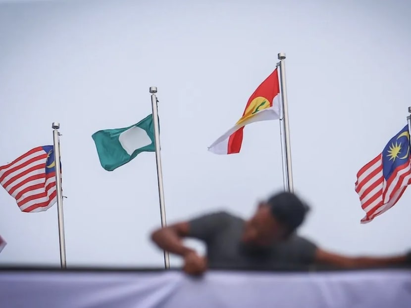 Umno and PAS flags are seen at the Putra World Trade Centre in Kuala Lumpur September 12, 2019, ahead of the Muslim Unity Rally.