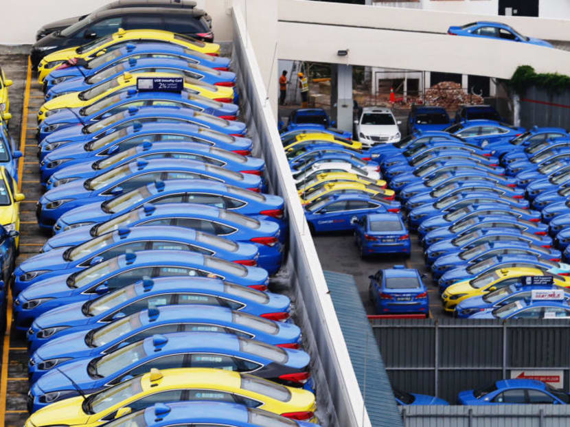 Comfort and CityCab taxis parked at the CityCab Building on Sept 20, 2017. Photo: Najeer Yusof/TODAY