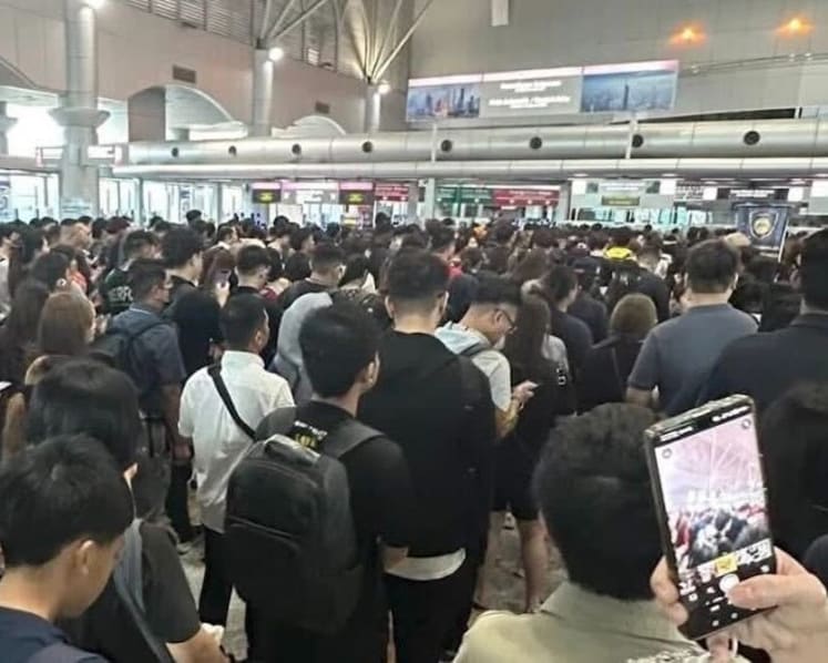 Tens of thousands delayed at Malaysia immigration checkpoints after five-hour system crash