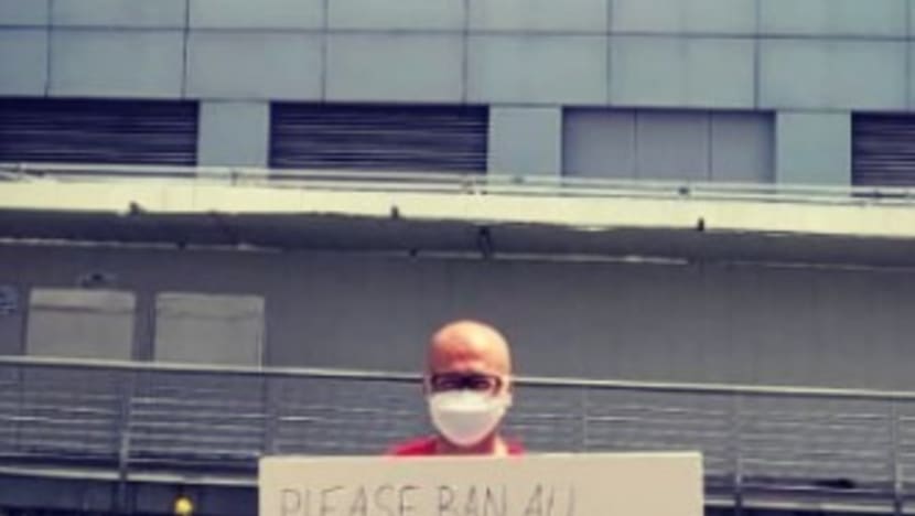 Activist Gilbert Goh to be charged with staging a protest without a permit after holding placard near ICA