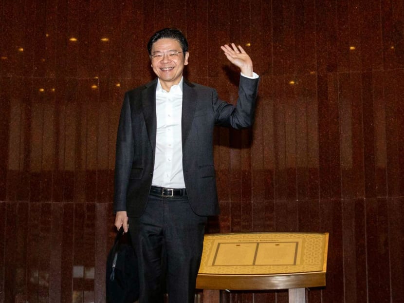 Deputy Prime Minister and Finance Minister Lawrence Wong arriving in Parliament to deliver the Budget statement on Feb 16, 2024.