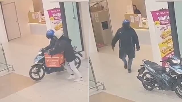 两匪冒充送货员 持械抢马国金店