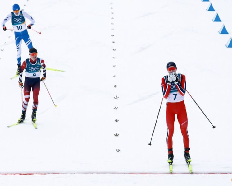 Nordic Combined-Norway's Oftebro skis from behind to first individual gold
