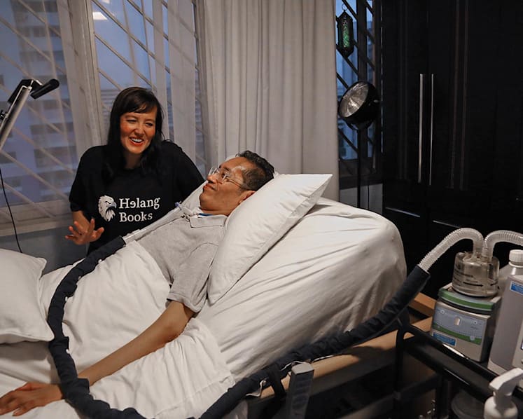 Paralysed former journalist co-writes book on rare degenerative disease ALS to show he 'still can give back to society'