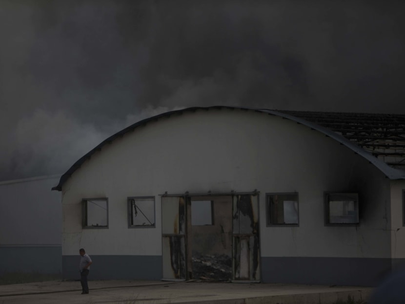 Gallery: China farm fire: Relatives scuffle with police, demand answers