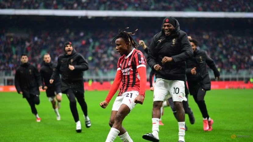Late goals snatch 3-2 win for Milan over Parma Late goals snatch 3-2 win for Milan over Parma