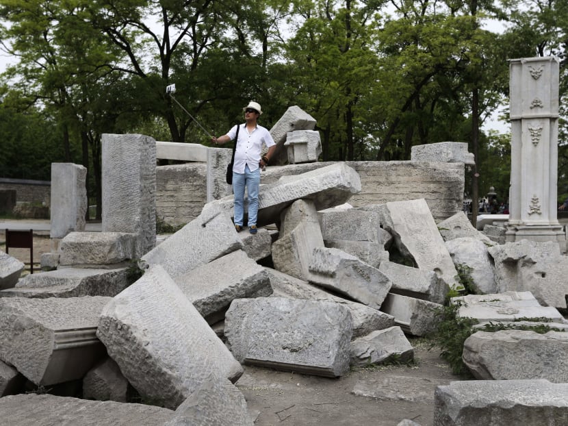 Replica of razed Chinese palace opens, but some prefer ruins