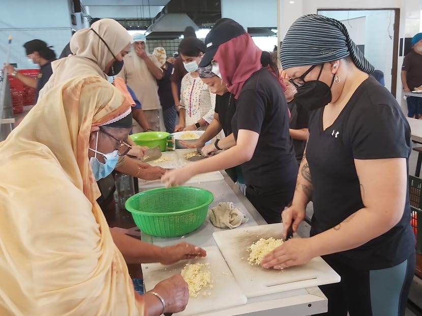 'It&rsquo;s beautiful to see everyone working in harmony': Malaysia volunteers out in force to aid flood victims