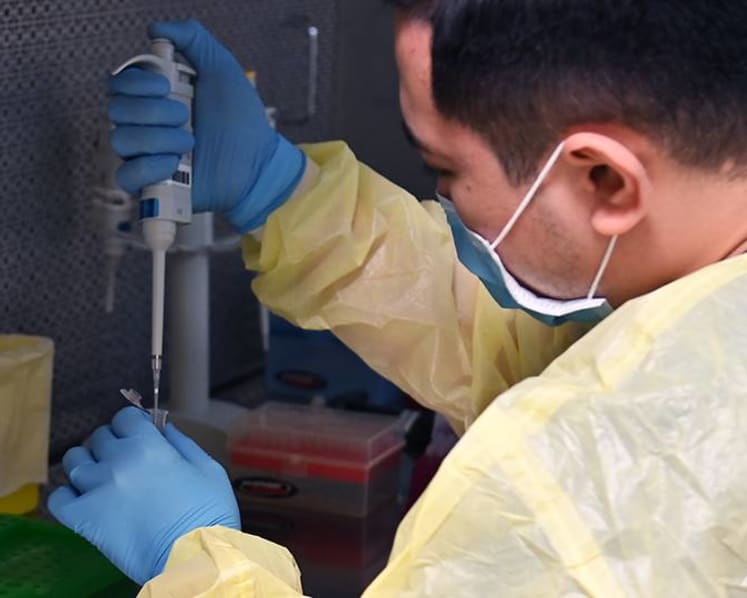 ‘We can’t afford to make any mistake’: Inside a COVID-19 testing lab in Singapore