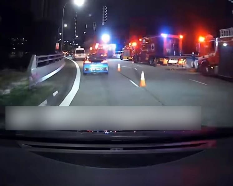 55-year-old driver dies after car skids along PIE and crashes into canal