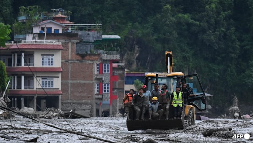 Live: Hundreds missing as rescuers race to find survivors after deadly Nepal-Tibet floods