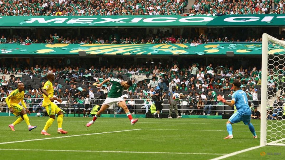 Mexico get World Cup party started with 2-0 win ov