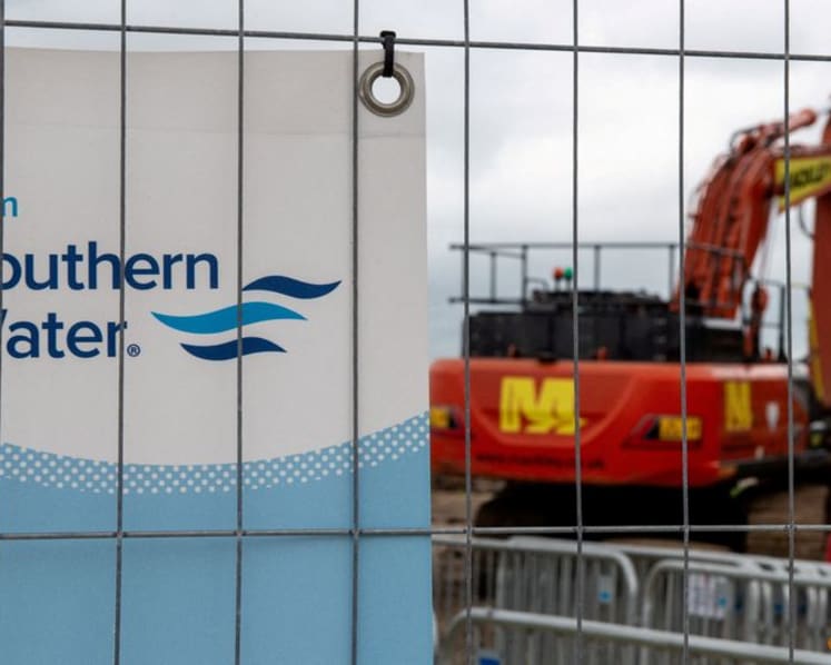 Ex-UK water boss charged in plot to 'manipulate' test results