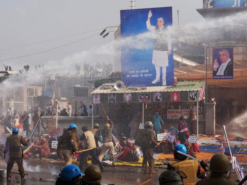 Gallery: Police clash with Indian guru supporters; 190 hurt