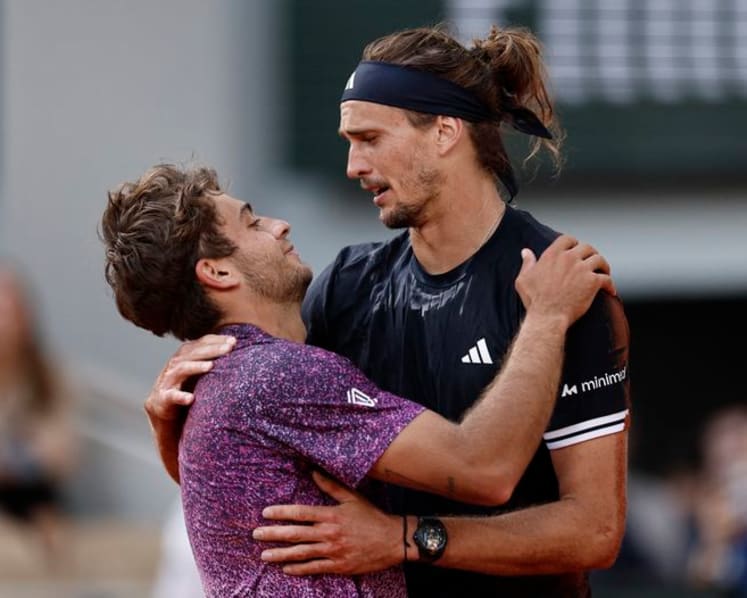 Zverev tears down the wall to enter Grand Slam winners' circle at French Open