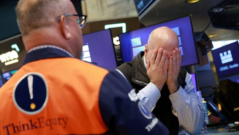 Stocks slide on US inflation surge, tech weakness