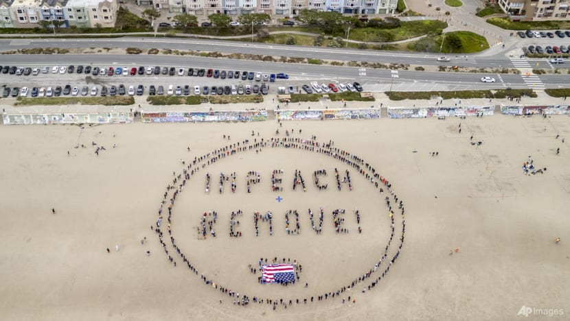 Thousands of protesters rally against Trump across US