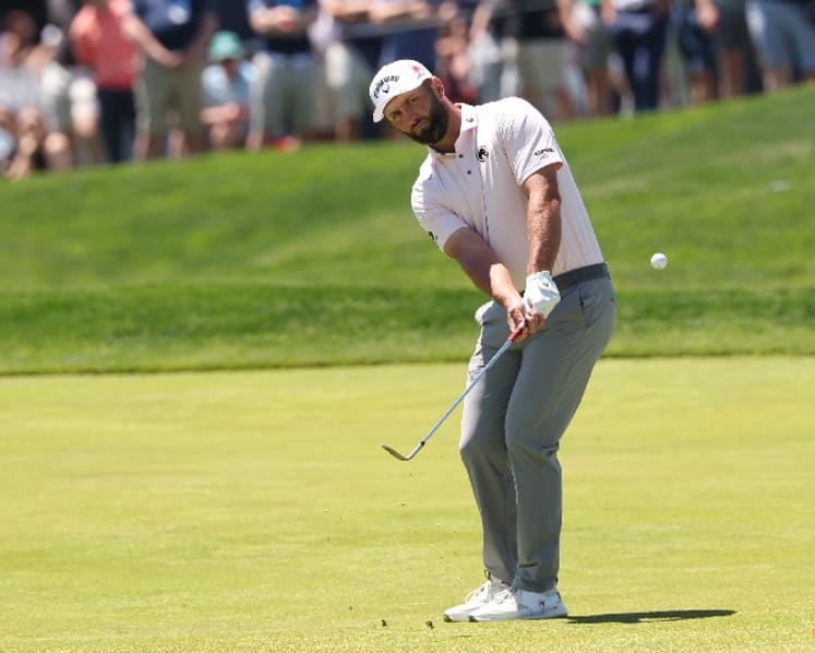 Rahm puts LIV spotlight aside after surging into PGA contention